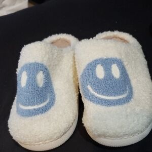 Cozy Cream Slippers with Blue Smiley Face